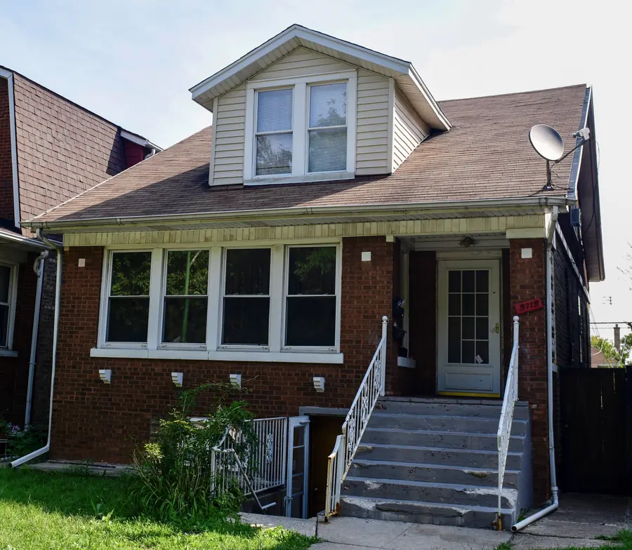 A brick Chicago bungalow on North Kolmar Avenue